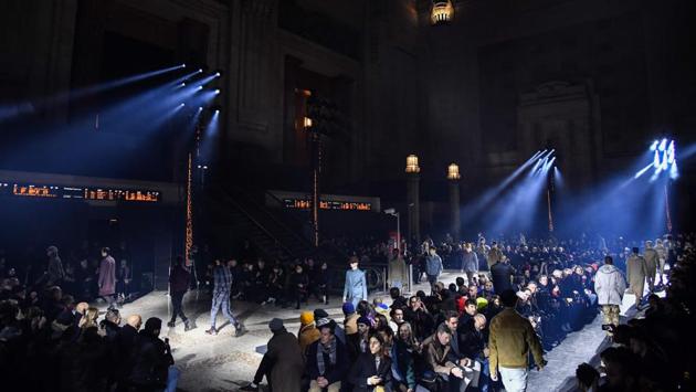 Models present creations for fashion house Ermenegildo Zegna during the Men's Fall/Winter 2019/20 fashion shows in Milan, on January 11, 2019. (Photo by Andreas SOLARO / AFP) (AFP)