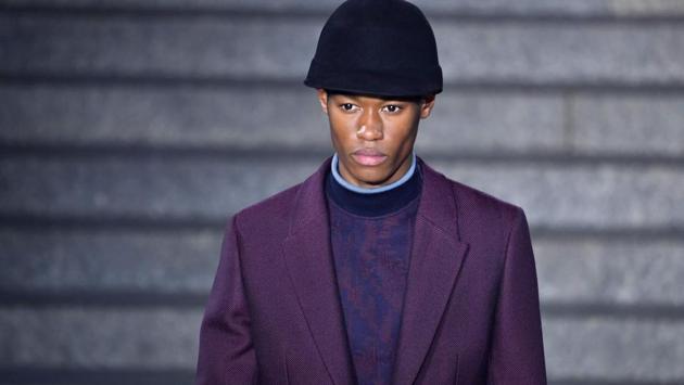 A model presents a creation for fashion house Ermenegildo Zegna during the Men's Fall/Winter 2019/20 fashion shows in Milan, on January 11, 2019. (Photo by Andreas SOLARO / AFP) (AFP)