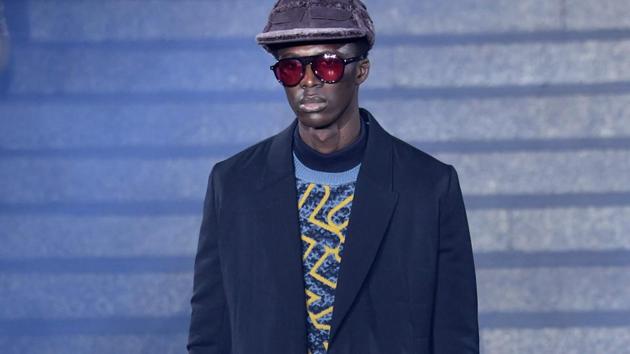 A model presents a creation for fashion house Ermenegildo Zegna during the Men's Fall/Winter 2019/20 fashion shows in Milan, on January 11, 2019. (Photo by Andreas SOLARO / AFP) (AFP)