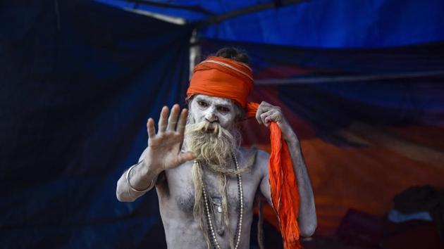 A sadhu at Babughat Transit point on his way to Gangasagar Mela in Kolkata, West Bengal. (Ashok Bhaumik / PTI) A sadhu at Babughat Transit point on his way to Gangasagar Mela in Kolkata, West Bengal. (Ashok Bhaumik / PTI)