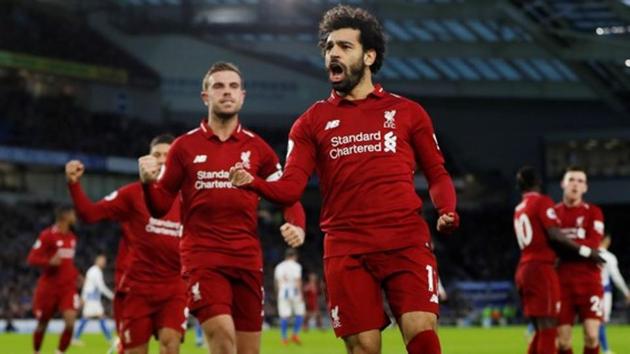 Liverpool's Mohamed Salah celebrates scoring their first goal with Jordan Henderson. (Action Images via Reuters) Liverpool's Mohamed Salah celebrates scoring their first goal with Jordan Henderson. (Action Images via Reuters)