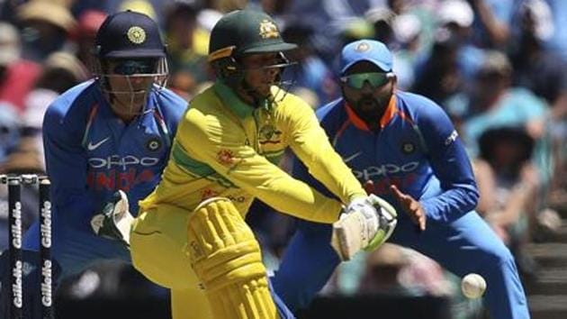 Australia's Usman Khawaja, center, plays a reverse sweep against India during their one day international cricket match in Sydney. (AP) Australia's Usman Khawaja, center, plays a reverse sweep against India during their one day international cricket match in Sydney. (AP)