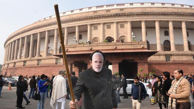 TMC Rajya Sabha MP Santanu Sen wears a mask of Prime Minister Narendra Modi during the winter session of Parliament, in New Delhi. (Arvind Yadav / HT Photo) TMC Rajya Sabha MP Santanu Sen wears a mask of Prime Minister Narendra Modi during the winter session of Parliament, in New Delhi. (Arvind Yadav / HT Photo)