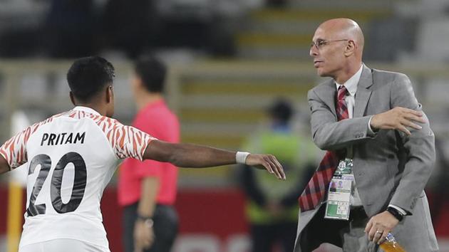 India's defender Pritam Kotal, left, celebrates with India's head coach Stephen Constantine during the AFC Asian Cup group A soccer match between Thailand and India.(AP)