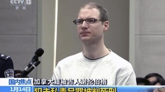 In this image taken from a video footage run by China's CCTV, Canadian Robert Lloyd Schellenberg attends his retrial at the Dalian Intermediate People's Court in Dalian, northeastern China's Liaoning province on January 14. (AP Photo) In this image taken from a video footage run by China's CCTV, Canadian Robert Lloyd Schellenberg attends his retrial at the Dalian Intermediate People's Court in Dalian, northeastern China's Liaoning province on January 14. (AP Photo)