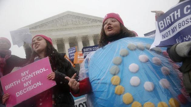 Margot Riphagen of New Orleans, La., wears a birth control pills costume during a protest in front of the U.S. Supreme Court in Washington.(AP)