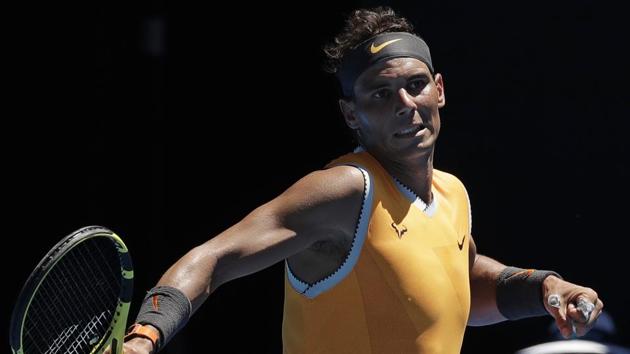 Spain's Rafael Nadal reacts after winning a point against Australia's James Duckworth during their first round match at the Australian Open.(AP)