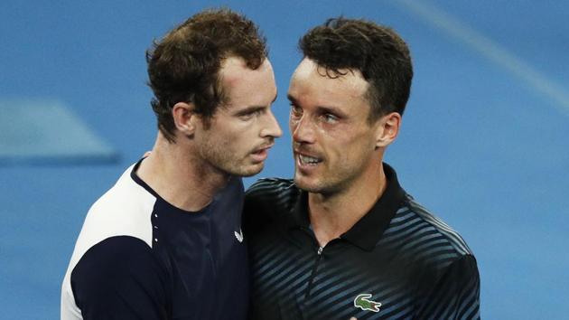 Britain's Andy Murray and Spain's Roberto Bautista Agut greet each other after the match.(REUTERS)