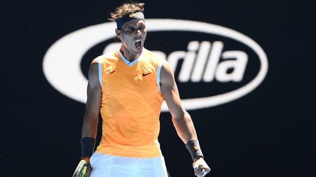 Rafael Nadal reacts after a point against James Duckworth during their match at the Australian Open.(AFP)