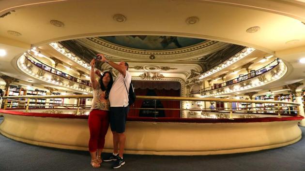 While the building saw its last live performance in 1973, it managed to stay in use until 1991 as a movie theatre --the last screening ever held here was of Sam Mendes’ ‘American Beauty’. A suffering economy had all but brought the wrecking ball to the building until it was taken over by the Argentine bookstore chain Ateneo. (Marcos Brindicci / REUTERS) While the building saw its last live performance in 1973, it managed to stay in use until 1991 as a movie theatre --the last screening ever held here was of Sam Mendes’ ‘American Beauty’. A suffering economy had all but brought the wrecking ball to the building until it was taken over by the Argentine bookstore chain Ateneo. (Marcos Brindicci / REUTERS)
