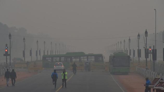 People walk near Raisina Hills on a cold, foggy morning, in New Delhi, Sunday, Jan 13, 2019. (PTI) People walk near Raisina Hills on a cold, foggy morning, in New Delhi, Sunday, Jan 13, 2019. (PTI)