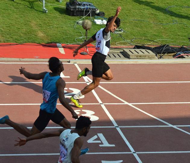 Boys U-21 200m gold meadllist Balakumar Nithin (TN) celebrating his win at Khelo India Youth Games (HT PHOTO) Boys U-21 200m gold meadllist Balakumar Nithin (TN) celebrating his win at Khelo India Youth Games (HT PHOTO)