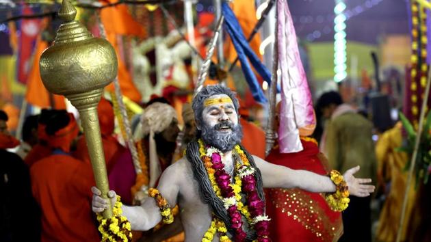 Sadhus of 13 akharas (seven Shaiva, three Vaishnava, two Udasina, and one Sikh) who have traditionally participated in the Kumbh, the largest religious congregation in the world, were the first to take the holy bath known as ‘Shahi Snan’. They marched dancing and humming devotional songs, all the way to the confluence of the rivers Ganga, Yamuna and the mythical Saraswati. (Rajesh Kumar Singh / AP) Sadhus of 13 akharas (seven Shaiva, three Vaishnava, two Udasina, and one Sikh) who have traditionally participated in the Kumbh, the largest religious congregation in the world, were the first to take the holy bath known as ‘Shahi Snan’. They marched dancing and humming devotional songs, all the way to the confluence of the rivers Ganga, Yamuna and the mythical Saraswati. (Rajesh Kumar Singh / AP)