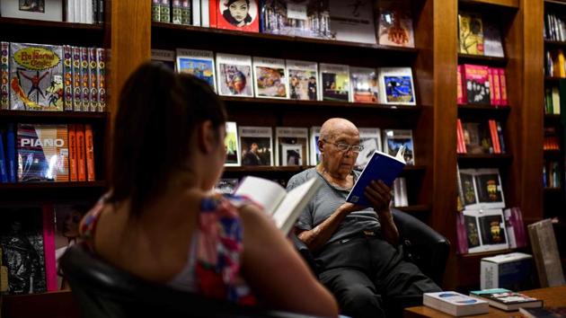 After years of extensive repairs, the building opened in late 2000, its stars this time not on celluloid or stage but in the printed word. The bookstore today houses over 120,000 titles and has its theatre boxes converted into comfortable reading spaces. (Ronaldo Schemidt / AFP) After years of extensive repairs, the building opened in late 2000, its stars this time not on celluloid or stage but in the printed word. The bookstore today houses over 120,000 titles and has its theatre boxes converted into comfortable reading spaces. (Ronaldo Schemidt / AFP)