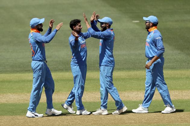 India celebrate the wicket of Australia's Usman Khawaja during their one day international cricket match in Adelaide. (AP)
