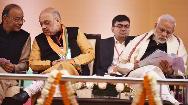 Prime Minister Narendra Modi along with BJP National President Amit Shah and Finance Minister Arun Jaitley on the second day of BJP National Executive Meet in New Delhi, on Saturday, January 12, 2019. (Raj K Raj/HT Photo) Prime Minister Narendra Modi along with BJP National President Amit Shah and Finance Minister Arun Jaitley on the second day of BJP National Executive Meet in New Delhi, on Saturday, January 12, 2019. (Raj K Raj/HT Photo)