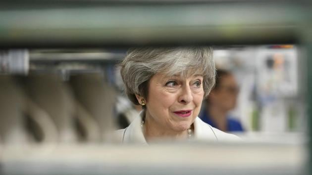 Britain's Prime Minister Theresa May looks on, during a visit to the Portmeirion pottery factory in Stoke-on-Trent, England, Monday, Jan. 14, 2019. She faces a tough vote on her EU divorce deal in the House of Commons on Tuesday (File Photo) (AP) Britain's Prime Minister Theresa May looks on, during a visit to the Portmeirion pottery factory in Stoke-on-Trent, England, Monday, Jan. 14, 2019. She faces a tough vote on her EU divorce deal in the House of Commons on Tuesday (File Photo) (AP)