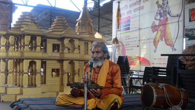 A sadhu worships as he sits next to a model of the proposed temple at Ram Janmabhoomi Nyas workshop in Ayodhya, Uttar Pradesh. Young and unemployed, Som Shekhar pines less for a job than the construction of the controversial temple -- and, as India’s general election approaches, says he will vote for the only man he believes can deliver it. (Sanjay Kanojia / AFP) A sadhu worships as he sits next to a model of the proposed temple at Ram Janmabhoomi Nyas workshop in Ayodhya, Uttar Pradesh. Young and unemployed, Som Shekhar pines less for a job than the construction of the controversial temple -- and, as India’s general election approaches, says he will vote for the only man he believes can deliver it. (Sanjay Kanojia / AFP)