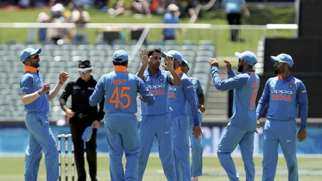 India’s Bhuvneshwar Kumar (C) celebrates the wicket of Australia's Aaron Finch during their one day international cricket match in Adelaide, Australia. India won the match by 6 wickets and have levelled the three-match series 1-1. (AP / PTI)