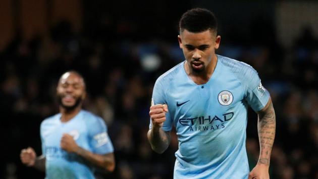 Premier League: Manchester City ease past 10-man Wolves to cut gap at ...