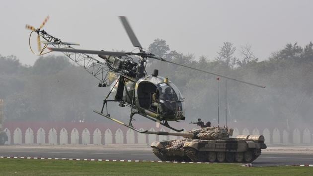 Indian Army helicopter and tank operators during a demonstration of skills. The parade brings out a showcase of the Army’s weapon systems and armament arrangement. Both M-777 howitzers and K9 Vajra, which were inducted last year, were showcased at the Army Day parade. (Vipin Kumar / HT Photo) Indian Army helicopter and tank operators during a demonstration of skills. The parade brings out a showcase of the Army’s weapon systems and armament arrangement. Both M-777 howitzers and K9 Vajra, which were inducted last year, were showcased at the Army Day parade. (Vipin Kumar / HT Photo)