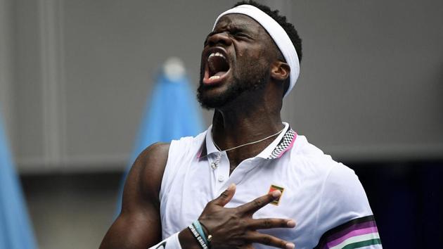 United States' Frances Tiafoe celebrates after defeating South Africa's Kevin Anderson in their second round match at the Australian Open.(AP)