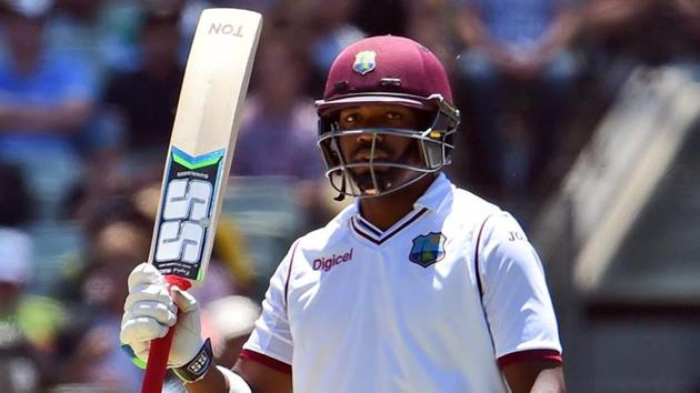 West Indies batsman Darren Bravo acknowledges the applause after scoring his half century against Australia.(AFP)