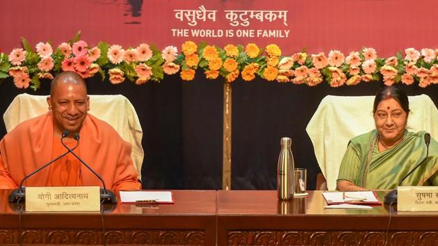 Lucknow: External Affairs Minister Sushma Swaraj and Uttar Pradesh Chief Minister Yogi Adityanath address a joint press conference on Pravasi Bhartiya Diwas, in Lucknow, Wednesday, Jan. 16, 2019.(PTI Photo)