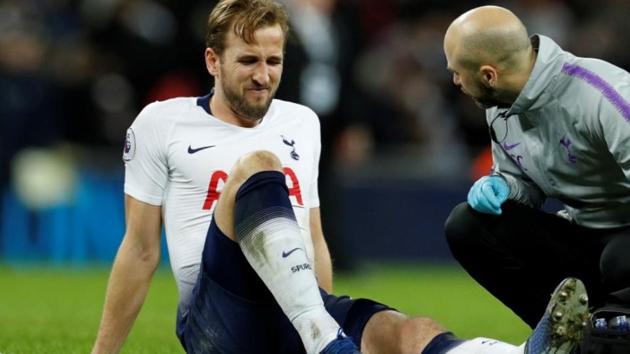 Harry Kane reacts as he receives treatment from the physio after sustaining an injury against Manchester United. (Reuters) Harry Kane reacts as he receives treatment from the physio after sustaining an injury against Manchester United. (Reuters)