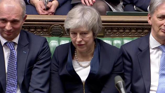 Prime Minister Theresa May sits down in Parliament after the vote on May's Brexit deal, in London, Britain, January 15, 2019 in this screengrab taken from video.(REUTERS)
