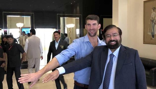 Michael Phelps and Harsh Goenka (right). (HT Photo) Michael Phelps and Harsh Goenka (right). (HT Photo)