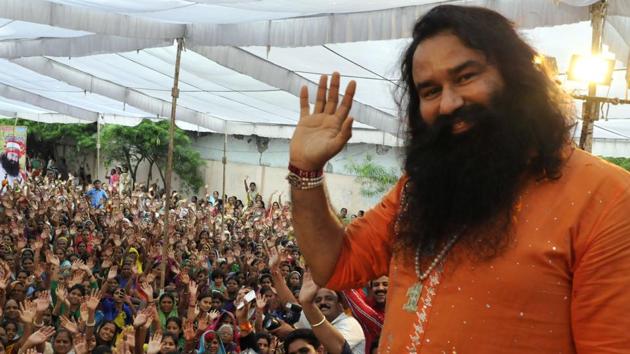 Dera Sacha Sauda chief Gurmeet Ram Rahim Singh has been ordered to serve his life in jail.(HT File Photo)