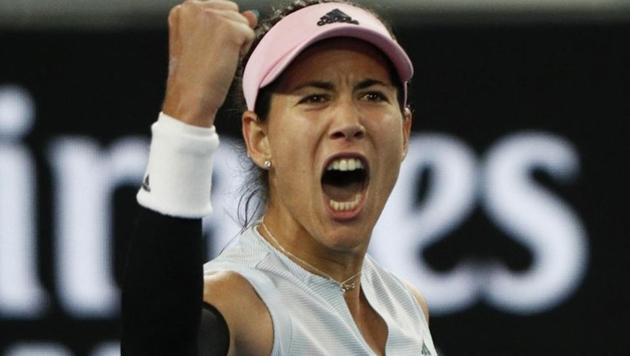 Spain's Garbine Muguruza celebrates after winning the match against Britain's Johanna Konta.(REUTERS)