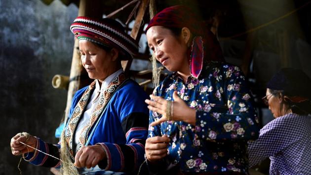 Thousands of Vietnamese women are trafficked or tricked across the border every year and in this remote mountainous region of Vietnam, spitting distance from the Chinese border, women and girls frequently vanish from communities. China’s buy-a-bride industry is booming, fuelled by a surplus of 30 million males. Some women go willingly, others are kidnapped or forced into marriage. (Nhac Nguyen / AFP) Thousands of Vietnamese women are trafficked or tricked across the border every year and in this remote mountainous region of Vietnam, spitting distance from the Chinese border, women and girls frequently vanish from communities. China’s buy-a-bride industry is booming, fuelled by a surplus of 30 million males. Some women go willingly, others are kidnapped or forced into marriage. (Nhac Nguyen / AFP)