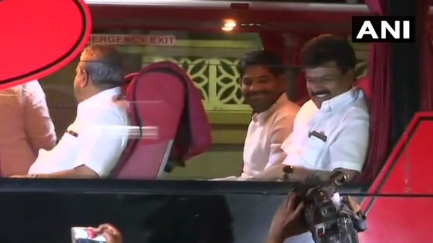 Congress MLAs are seen seated in a luxury bus in Bengaluru on their way to a Eagleton resort on the outskirts of the city. (ANI/Twitter) Congress MLAs are seen seated in a luxury bus in Bengaluru on their way to a Eagleton resort on the outskirts of the city. (ANI/Twitter)