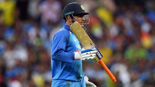 MS Dhoni walks back to the pavilion during the third ODI match against Australia.(AFP)