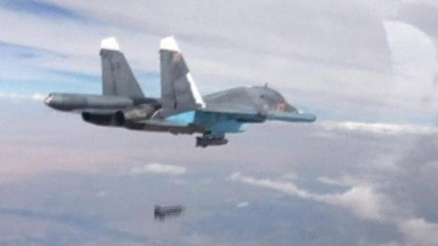 The file photo shows a Russian Su-34 fighter-bomber dropping a bomb in the air over Syria. Two Russian fighter jets have collided in mid-air in the Far East, the Defense Ministry said Friday.(REUTERS/ Representative Image)