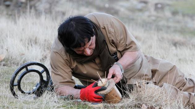 After losing his first leg in 1989 to an Italian made mine in the Bamo region near Iran and the Iraqi Kurdish province of Sulaymaniyah, Ali retired from service and began what has become decades of travelling around Kurdistan, dismantling explosive devices. (Ako Rasheed / REUTERS) After losing his first leg in 1989 to an Italian made mine in the Bamo region near Iran and the Iraqi Kurdish province of Sulaymaniyah, Ali retired from service and began what has become decades of travelling around Kurdistan, dismantling explosive devices. (Ako Rasheed / REUTERS)