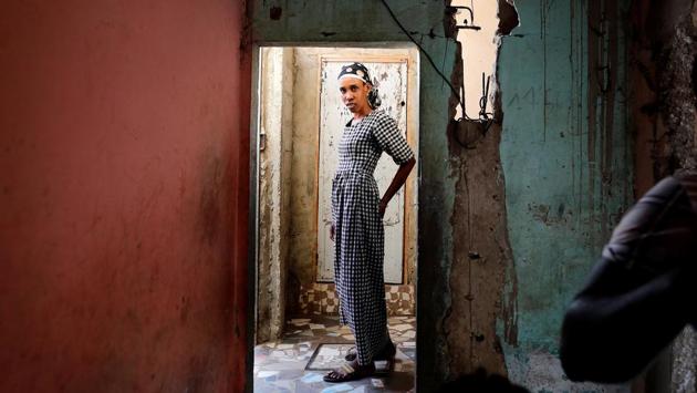 A woman is pictured at the entrance of the house in Ouakam neighbourhood, Dakar, Senegal. (Zohra Bensemra / REUTERS) A woman is pictured at the entrance of the house in Ouakam neighbourhood, Dakar, Senegal. (Zohra Bensemra / REUTERS)