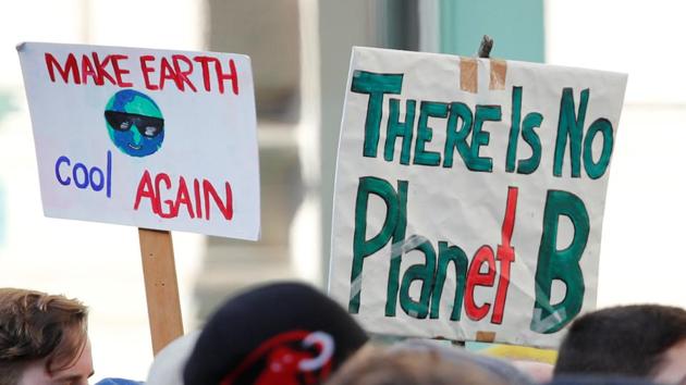 School pupils demonstrate during a "March against climate change " at the Paradeplatz square in Zurich, Switzerland on January 18. (REUTERS) School pupils demonstrate during a "March against climate change " at the Paradeplatz square in Zurich, Switzerland on January 18. (REUTERS)