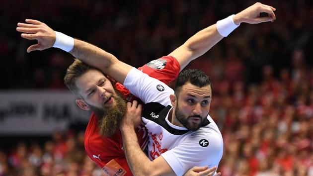Denmark’s Nikolaj Oris Nielsen (L) and Tunisia’s Mohamed Soussi vie during the IHF Men’s World Championship 2019 Group C handball match between Denmark and Tunisia at the Jyske Bank Boxen arena in Herning, Denmark. (Jonathan Nackstrand / AFP) Denmark’s Nikolaj Oris Nielsen (L) and Tunisia’s Mohamed Soussi vie during the IHF Men’s World Championship 2019 Group C handball match between Denmark and Tunisia at the Jyske Bank Boxen arena in Herning, Denmark. (Jonathan Nackstrand / AFP)
