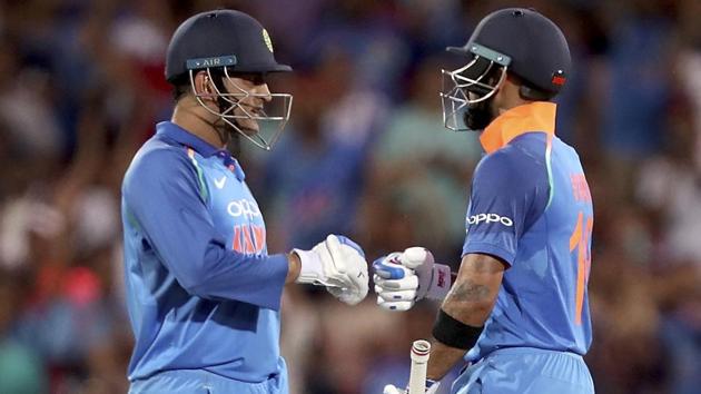 MS Dhoni and Virat Kohli in action during the ODI encounter between India and Australia.(AP)