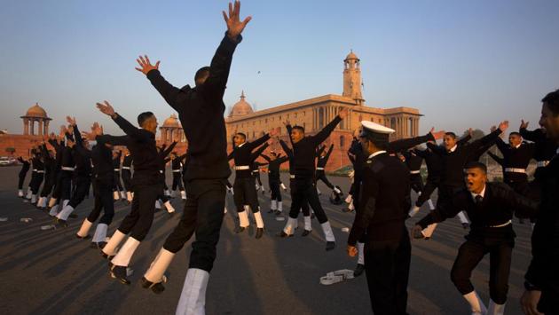 Indian Naval soldiers warm up during rehearsals for the upcoming Republic Day parade at the Raisina Hills in New Delhi. (Manish Swarup / AP) Indian Naval soldiers warm up during rehearsals for the upcoming Republic Day parade at the Raisina Hills in New Delhi. (Manish Swarup / AP)