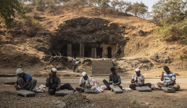 Wadar workers reshape stone blocks at the Elephanta Caves, a Unesco world heritage site in Maharashtra. ’It is a matter of prestige for us that we are being roped in to work on such a site.’ says Tukaram Pawar, 56.(Aalok Soni / HT Photo)