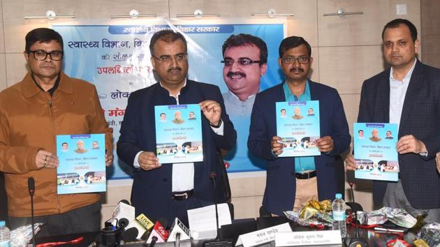 Bihar Health Minister Mangal Pandey is releasing 16 months achievements book of his department at State Health Society in Patna(Santosh Kumar/Hindustan Times)