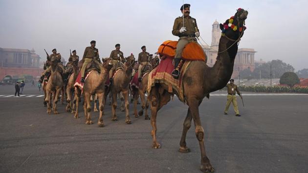 Border Security Force personnel ride on camels during rehearsals ahead of the Republic Day parade, at Vijay chowk, in New Delhi. (Sanchit Khanna / HT Photo) Border Security Force personnel ride on camels during rehearsals ahead of the Republic Day parade, at Vijay chowk, in New Delhi. (Sanchit Khanna / HT Photo)