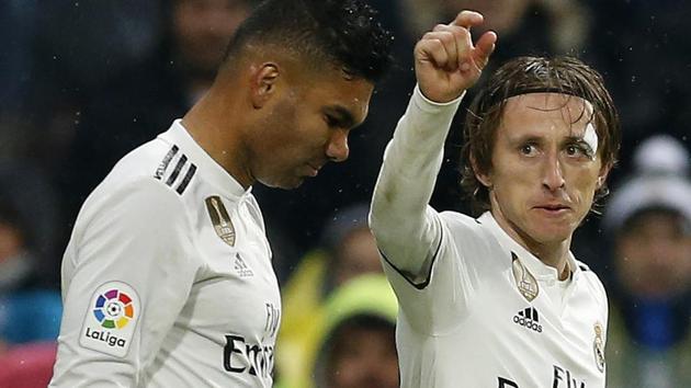 Real Madrid's Luka Modric, right, celebrates his goal with his teammate Casemiro.(AP)