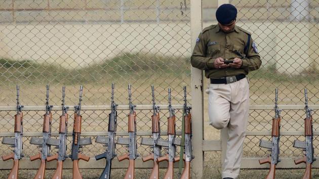 A Central Reserve Police Force (CRPF) commando looks at his mobile phone during a break in rehearsals ahead of Republic Day, in Jalandhar, Punjab. (Shammi Mehra / AFP) A Central Reserve Police Force (CRPF) commando looks at his mobile phone during a break in rehearsals ahead of Republic Day, in Jalandhar, Punjab. (Shammi Mehra / AFP)