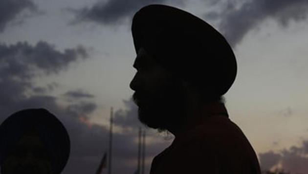 A Sikh man has been brutally assaulted in an alleged hate crime by a white man who pulled his beard, kicked and punched him in the face at a store in the US, the latest such incident in the country. (Reuters/ Representative Image) A Sikh man has been brutally assaulted in an alleged hate crime by a white man who pulled his beard, kicked and punched him in the face at a store in the US, the latest such incident in the country. (Reuters/ Representative Image)