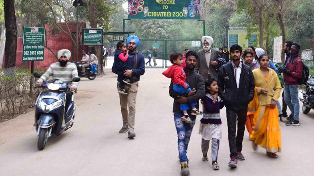 Chandigarh, India January 20: Visitors come out from Chattbir Zoo after it was closed as a man was mauled to death by a pair of lions after entering their enclosure on Sunday, January 20, 2019. (HT Photo/Ravi Kumar)(HT Photo) Chandigarh, India January 20: Visitors come out from Chattbir Zoo after it was closed as a man was mauled to death by a pair of lions after entering their enclosure on Sunday, January 20, 2019. (HT Photo/Ravi Kumar)(HT Photo)